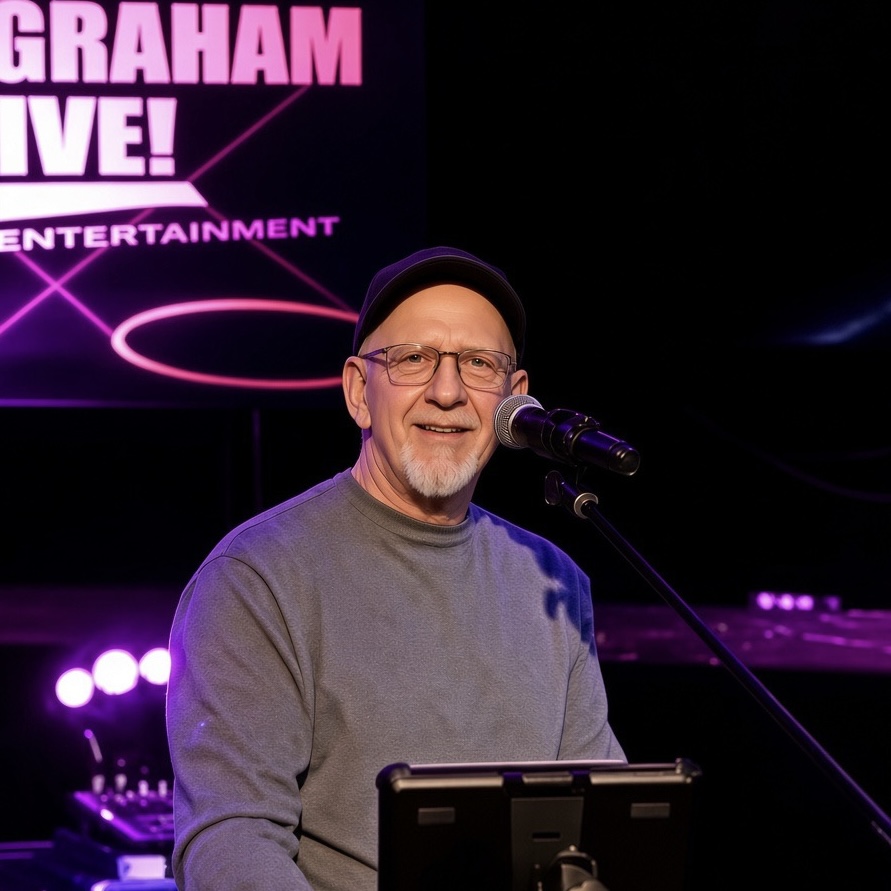 Dave Graham performing under purple stage lighting